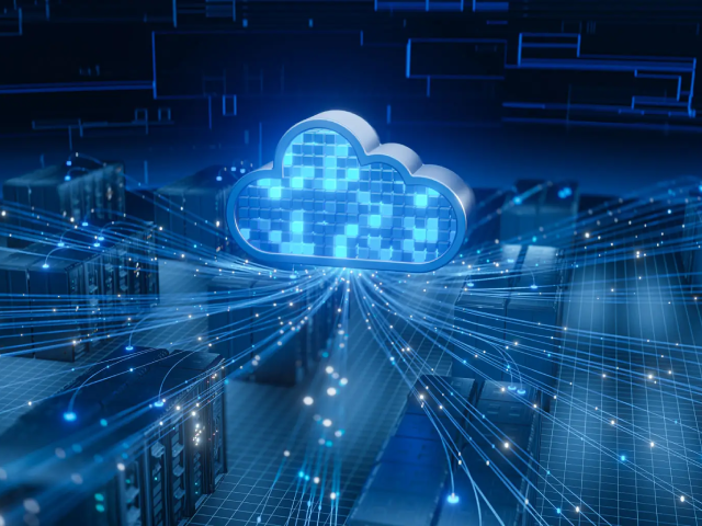 Cloud computing symbol with data connections over server racks, representing IT services and technology solutions for businesses.